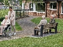 Vary___This_is_a_calm_park_scene_next_to_a_nursing_home_in_Belgium_or_France__Add_one_elderly_person kopie.webp