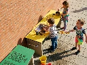D Vary_Image___3_School_kids__ages_5_to_7_yo__in_casual_colourfull_clothing_play_around_this_plastic_m(3) kopie.webp